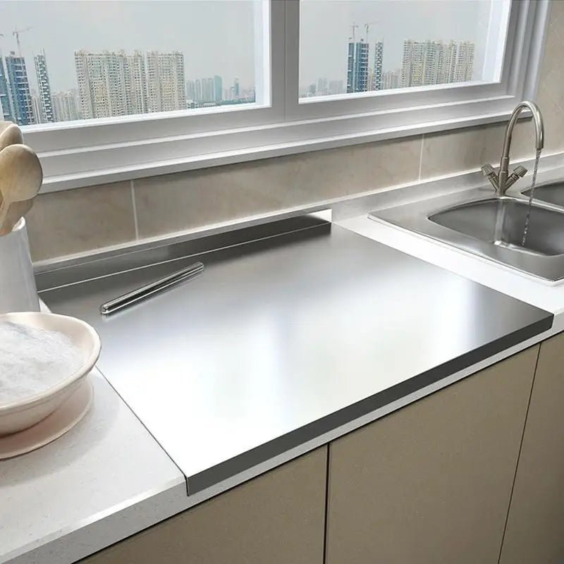 PLANCHE A DECOUPER EN ACIER INOXYDABLE A REBORD - Connection Cuisine