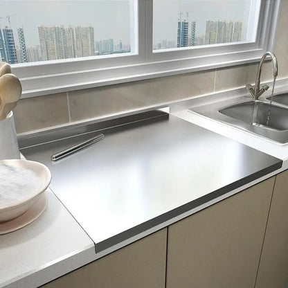 PLANCHE A DECOUPER EN ACIER INOXYDABLE A REBORD - Connection Cuisine